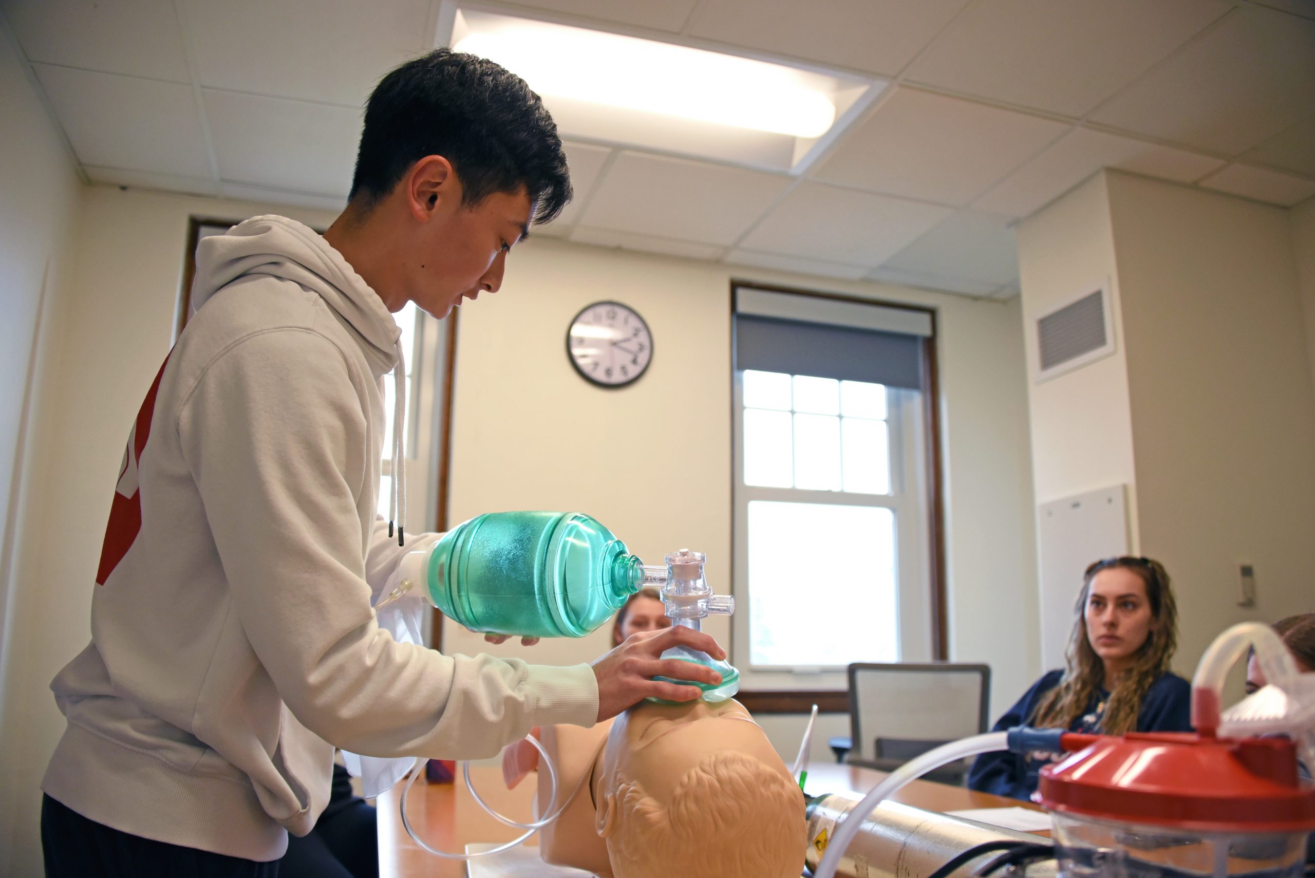 Students practice medical techniques in EMT Training